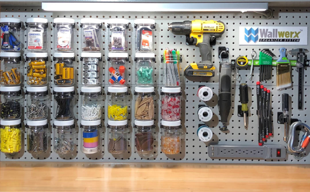 Workstation organization for tools and small items on pegboard by Wallwerx system